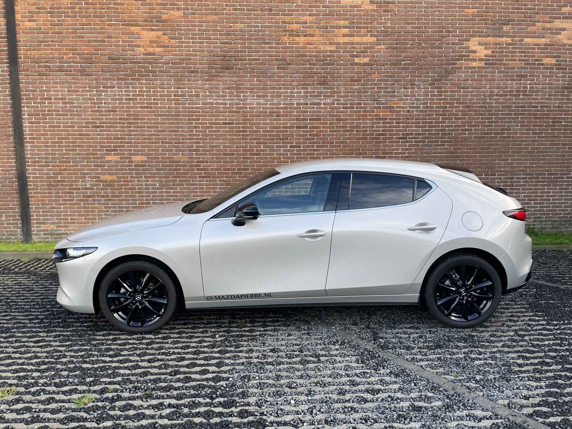 Mazda 3 2.5 e-SkyActiv-G M Hybrid 140 Homura (bj 2025), Auto's, Voorwielaandrijving, Stof, Gebruikt, 4 cilinders