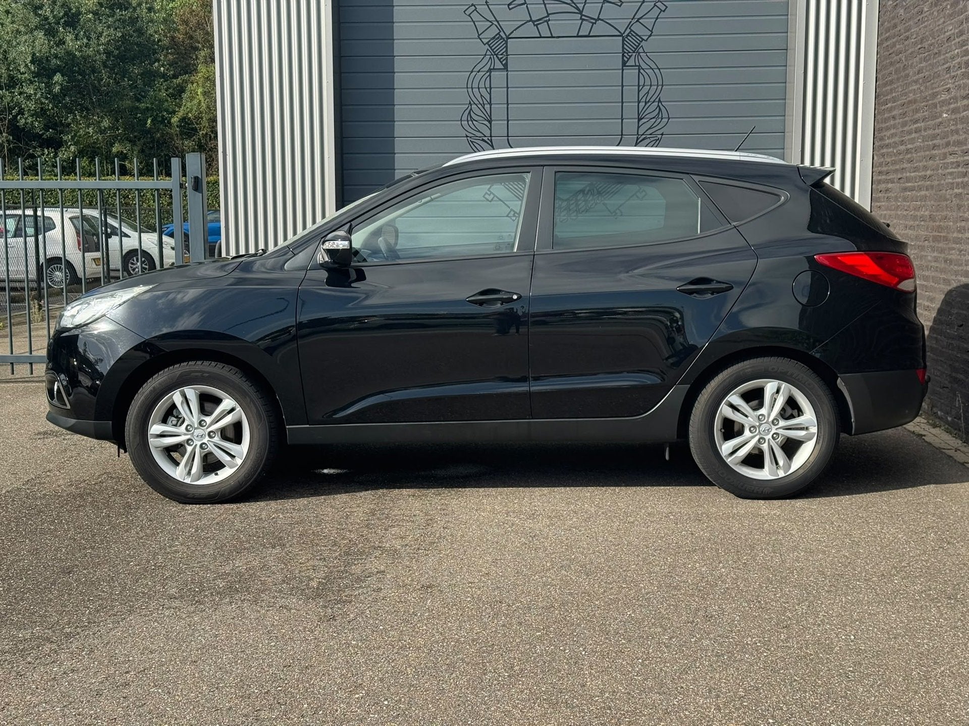 Hyundai Ix35 1.6i GDI Style Ecc, Auto's, Voorwielaandrijving, Euro 5, 4 cilinders, Leder en Stof