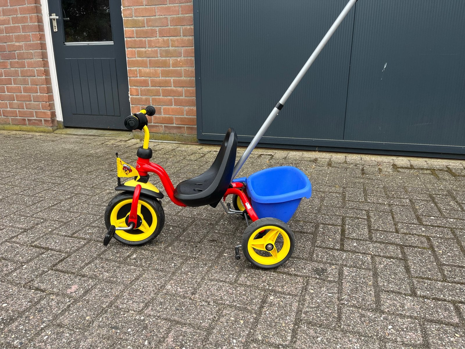 Puky driewieler met duwstang en kiepbakje, Ophalen, Gebruikt, Velgrem, Duwstang