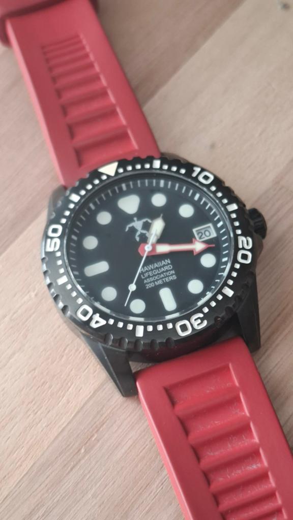 Origineel Hawaii Lifeguard horloge - Zwart met rode band, Sieraden, Tassen en Uiterlijk, Horloges | Heren, Overige merken, Overige materialen