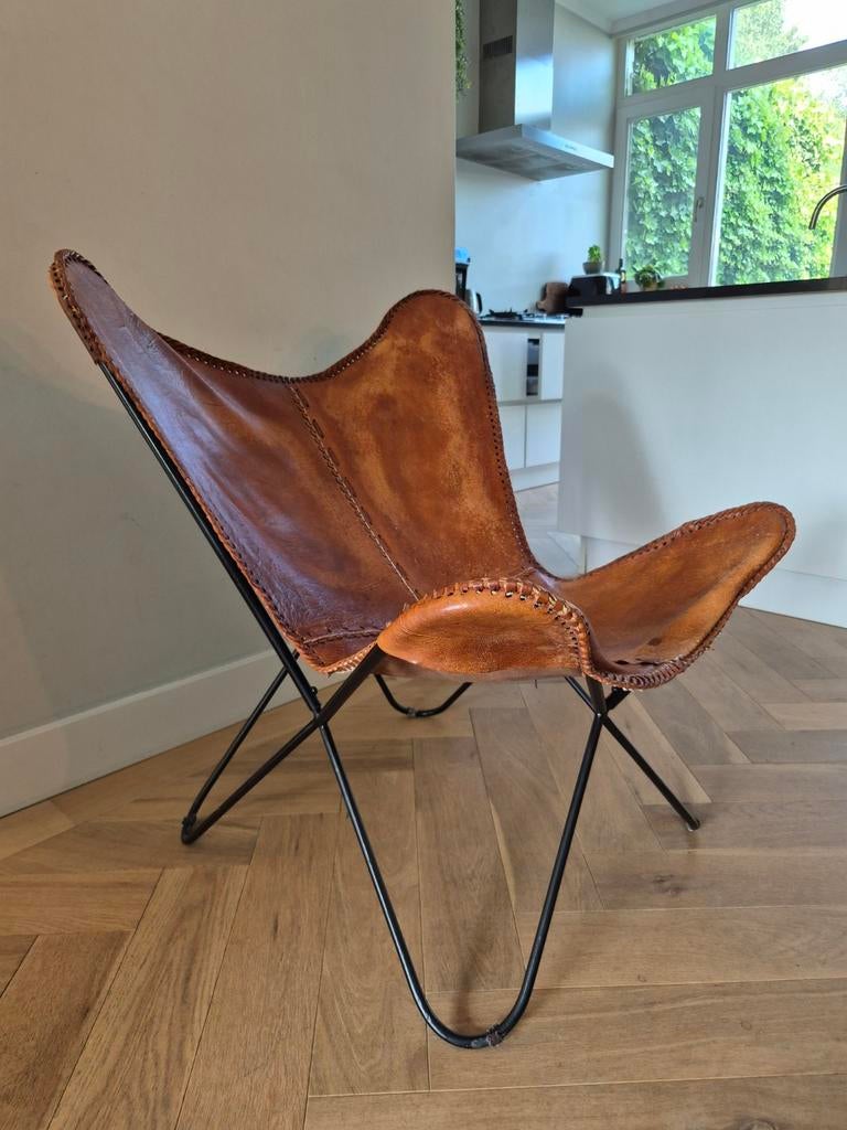 Vlinderstoel echt leder in goede staat!, Huis en Inrichting, Stoelen, Ophalen of Verzenden, Zo goed als nieuw, Bruin, Eén