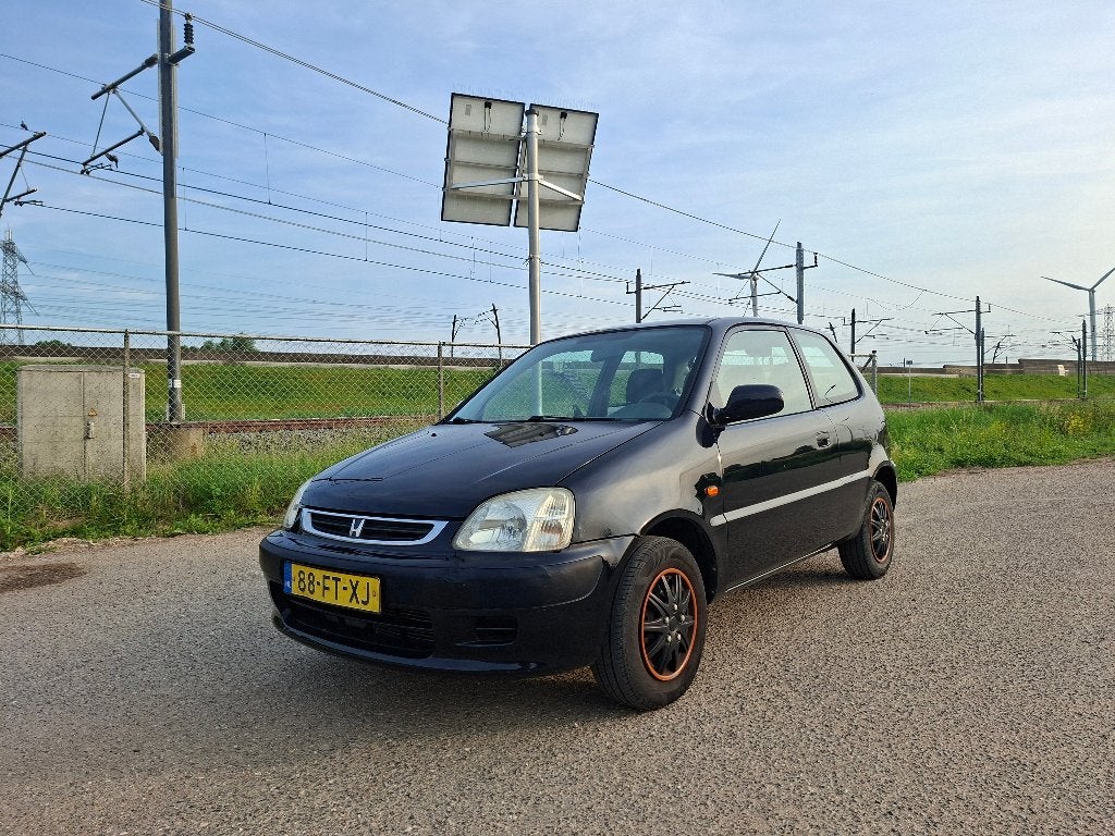 GERESERVEERD Honda LOGO 1.3 CVT Automaat 2000 Zwart, Auto's, 31 €/maand, 4 cilinders, Zwart, Bedrijf