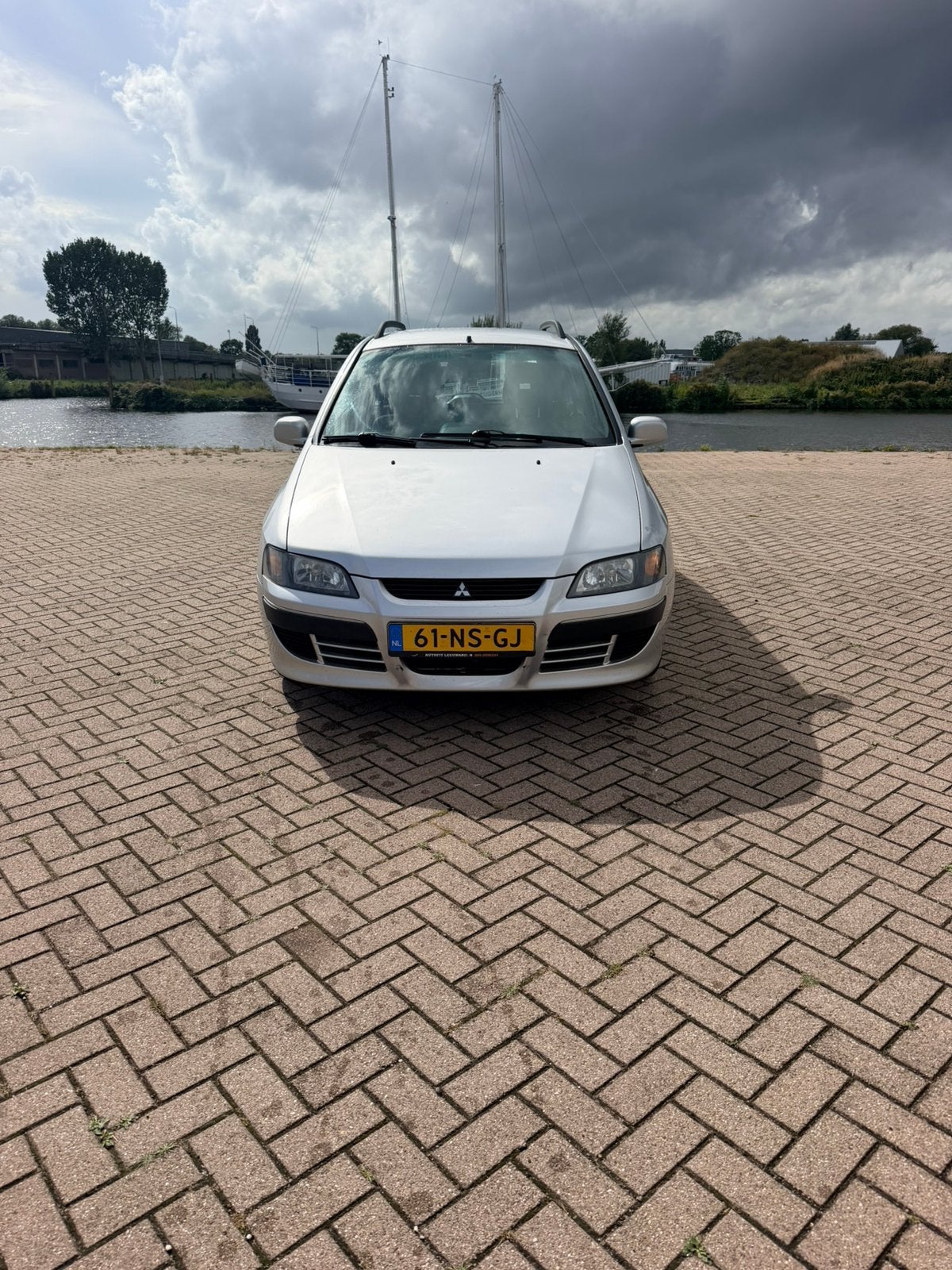 Mitsubishi Space Star 1.6 Comfort AUT 2004 Grijs, Auto's, Euro 5, 1195 kg, Zwart, 4 cilinders