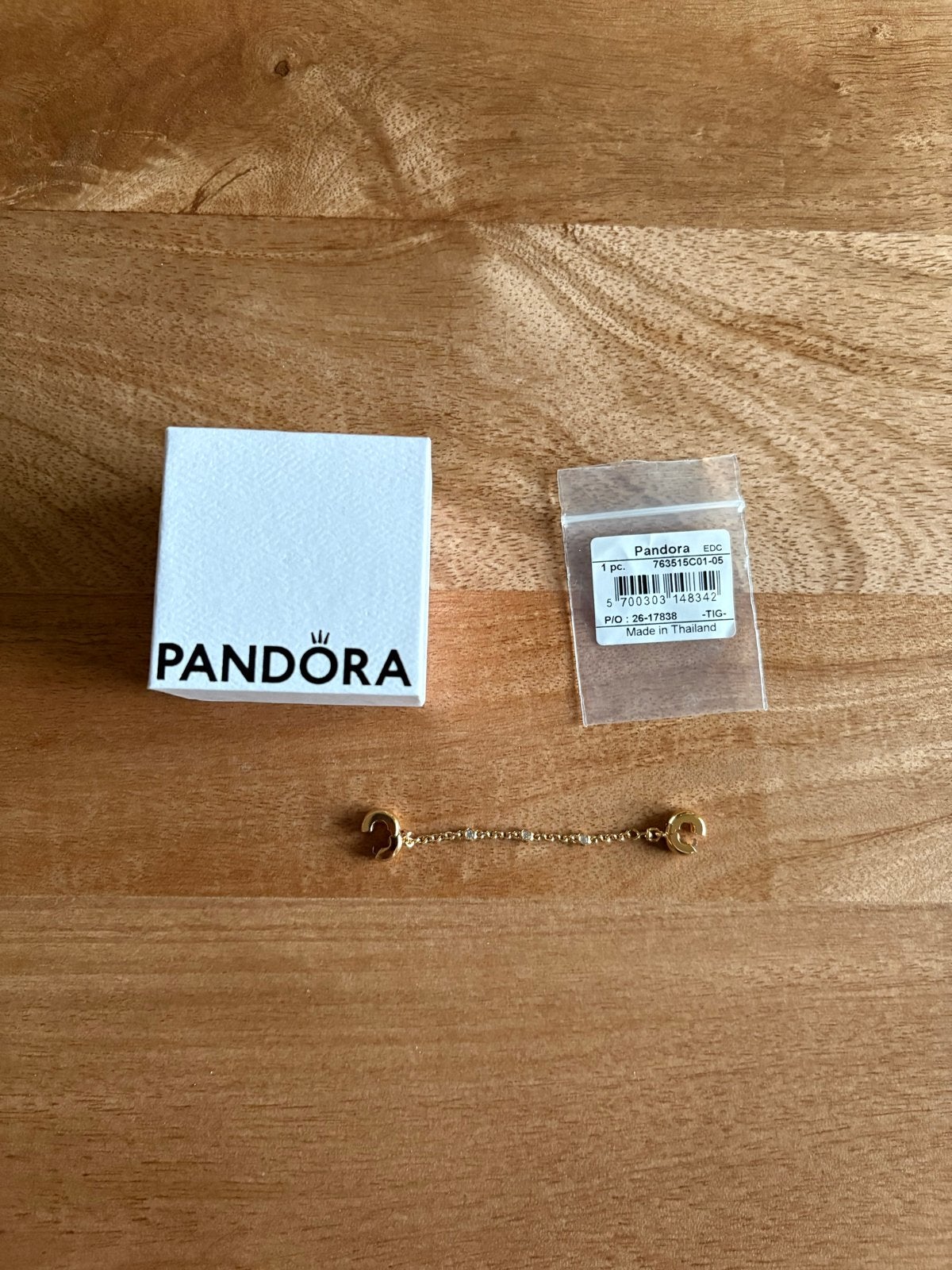 Pandora veiligheidsketting goudkleurig met zirkonia, Overige materialen, Pandora, Nieuw, Ophalen of Verzenden