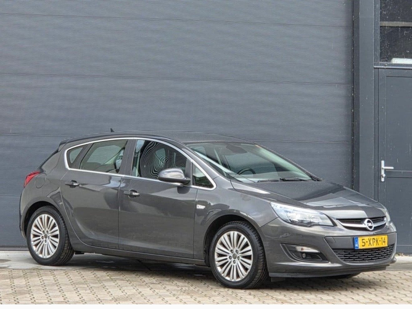 Opel Astra 1.4 Turbo Ecotec 88KW 5D 2014 Grijs, Auto's, Voorwielaandrijving, 680 kg, 4 cilinders, Origineel Nederlands