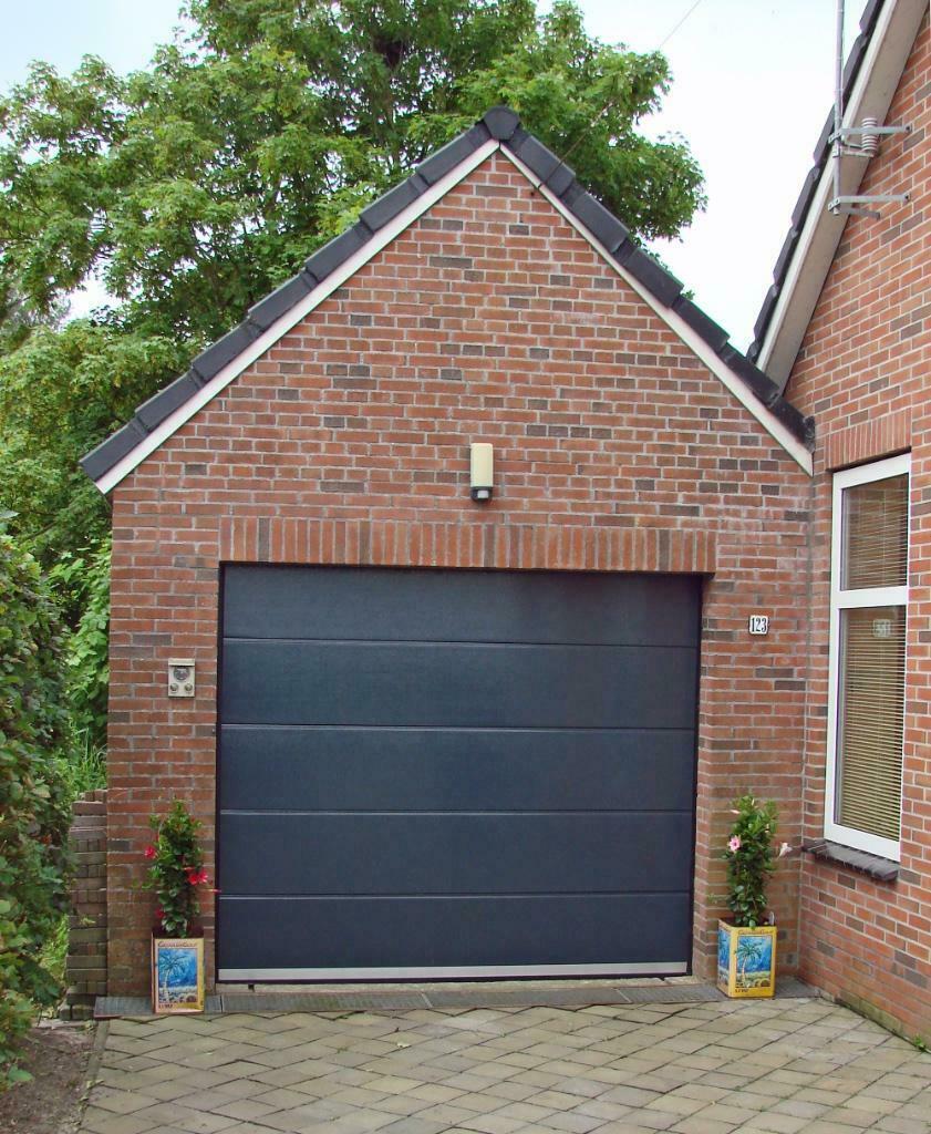Elektrische sectionale garagedeuren uit voorraad leverbaar!!