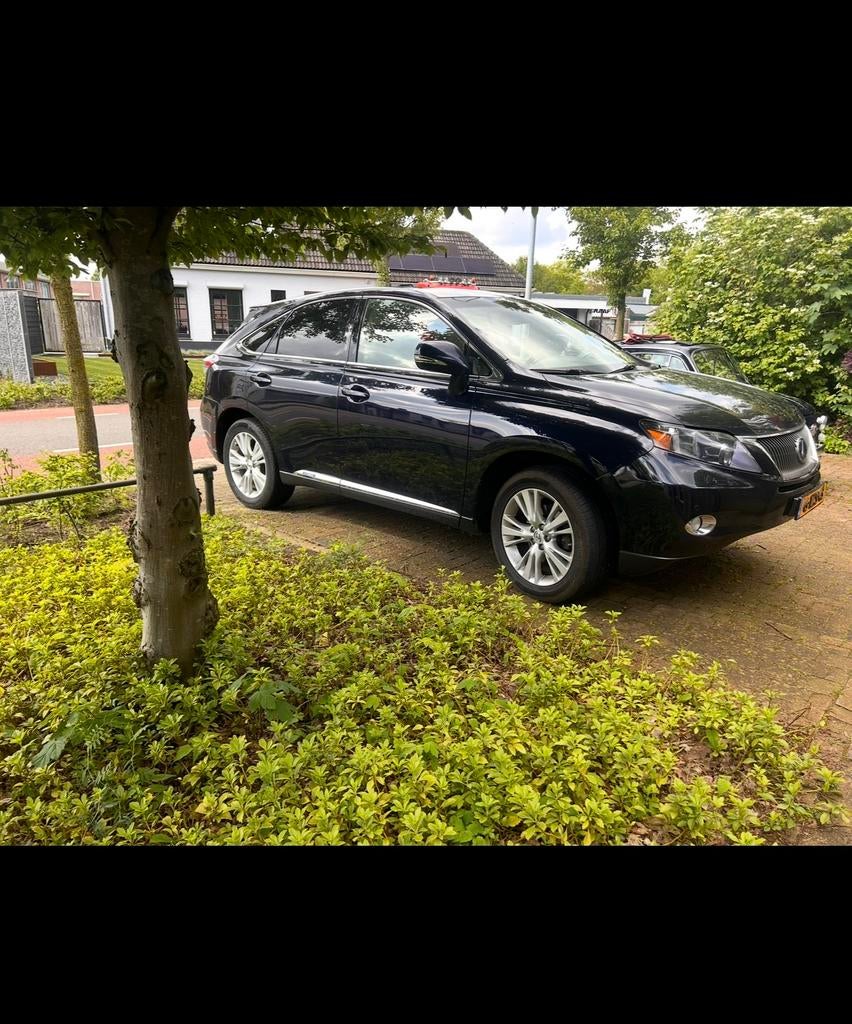 LAATSTE KANS! 🚨Lexus RX 450h Hybrid 299pk CVT 2010 Blauw, Auto's, Lexus, Automaat, 249 pk, Beige, Navigatiesysteem