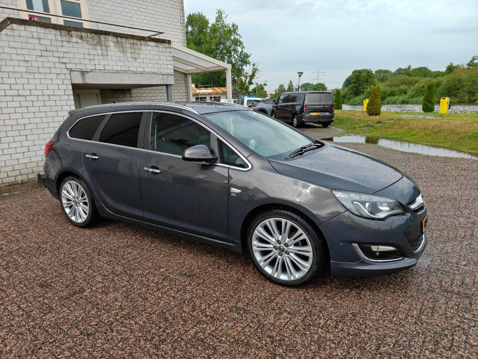 Opel Astra Sports Tourer 1.4 Turbo Sport + OPC Line, Voorwielaandrijving, 4 cilinders, Handgeschakeld, 1364 cc