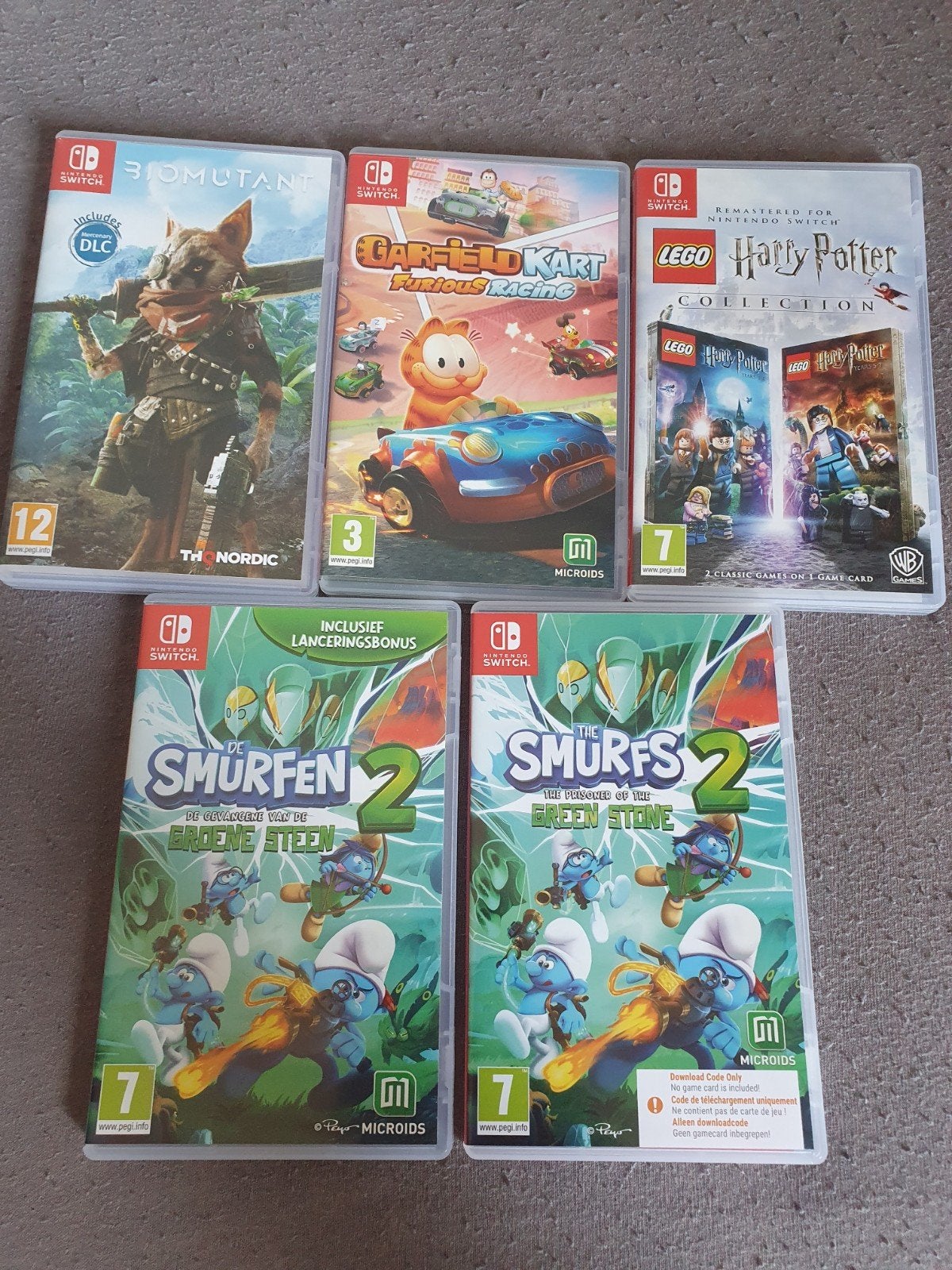 Nintendo Switch Games: Biomutant, Garfield Kart, Smurfen 2,, Overige genres, Ophalen of Verzenden, Zo goed als nieuw, Eén computer