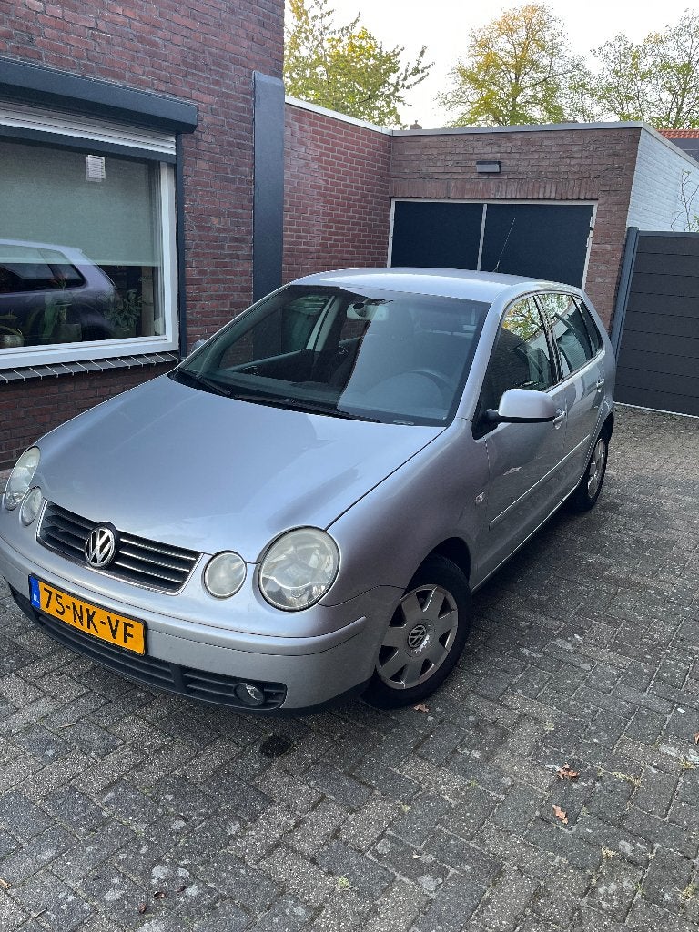Volkswagen Polo 1.4 55KW 2003 Grijs, Auto's, Volkswagen, Voorwielaandrijving, 4 cilinders, Origineel Nederlands, Handgeschakeld