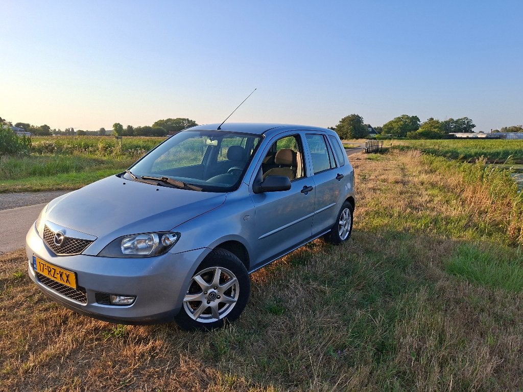 Mazda 2 1.4 16V 2005 Blauw, Auto's, Mazda, Voorwielaandrijving, 1025 kg, 40 €/maand, Zwart