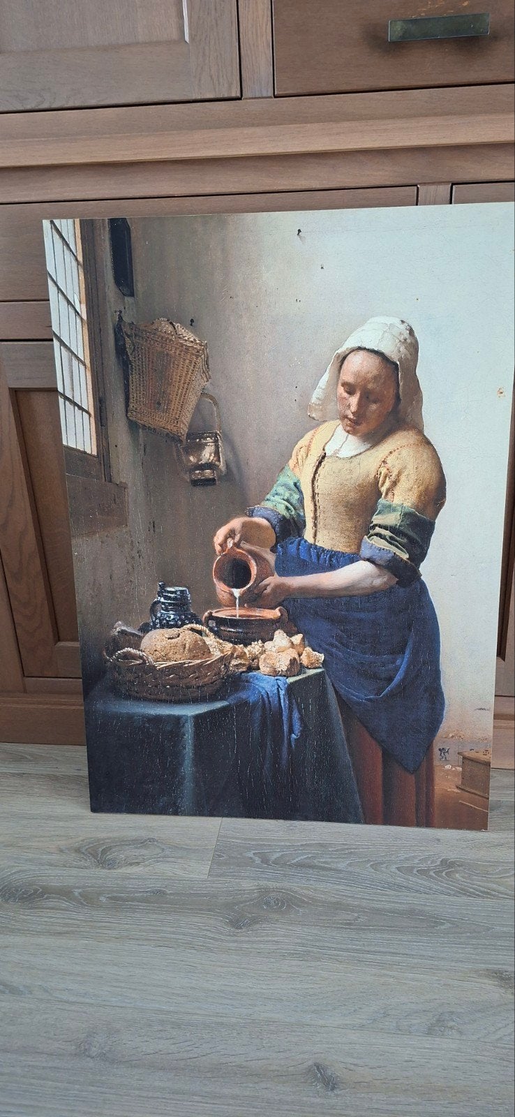 Schilderij melkmeisje, Ophalen