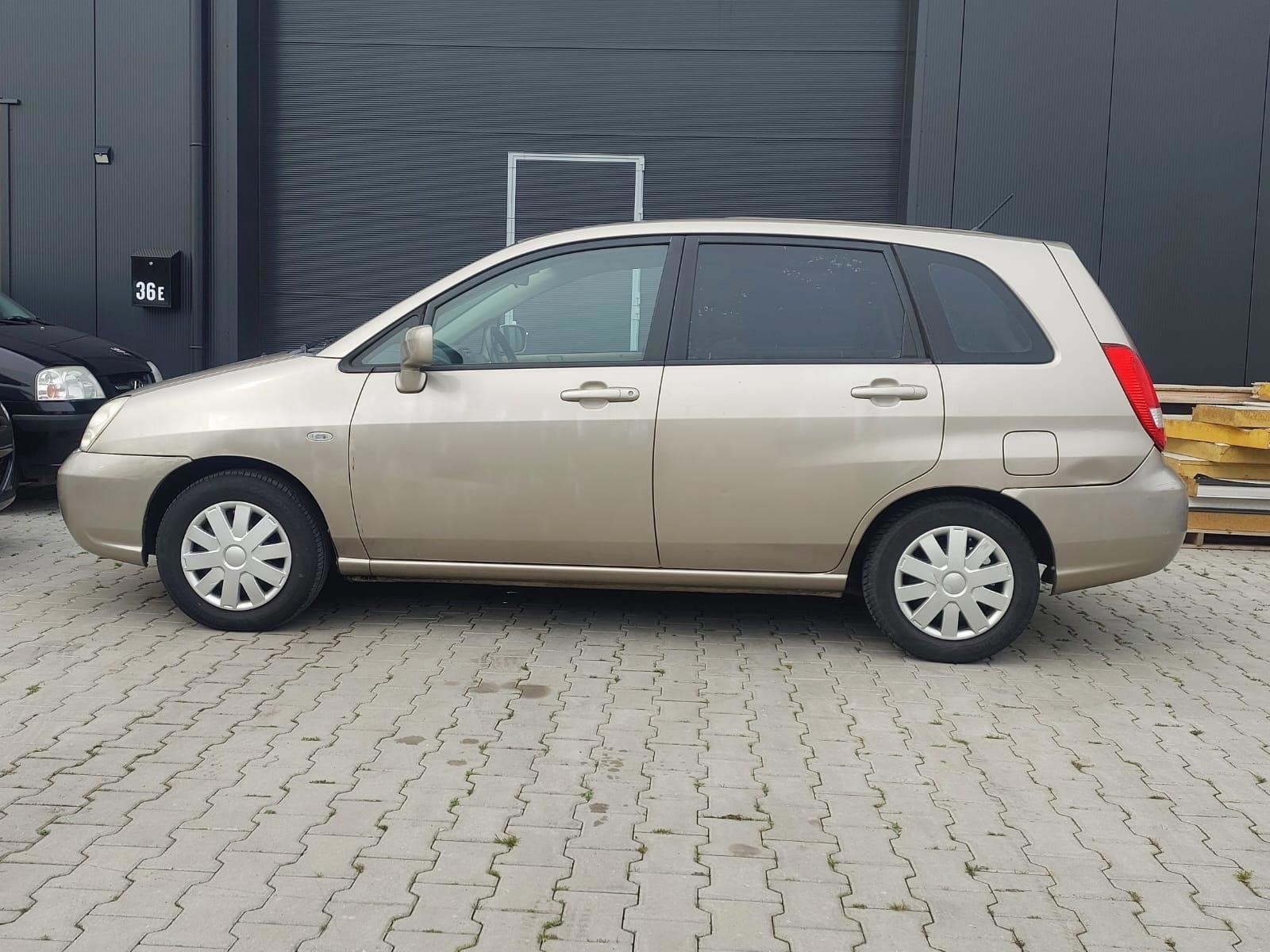 Suzuki Liana € 1249,-1.6 GLX APK 1 JAAR 28/05/2027 AIRCO, Auto's, Suzuki, Voorwielaandrijving, Stof, Gebruikt, Beige