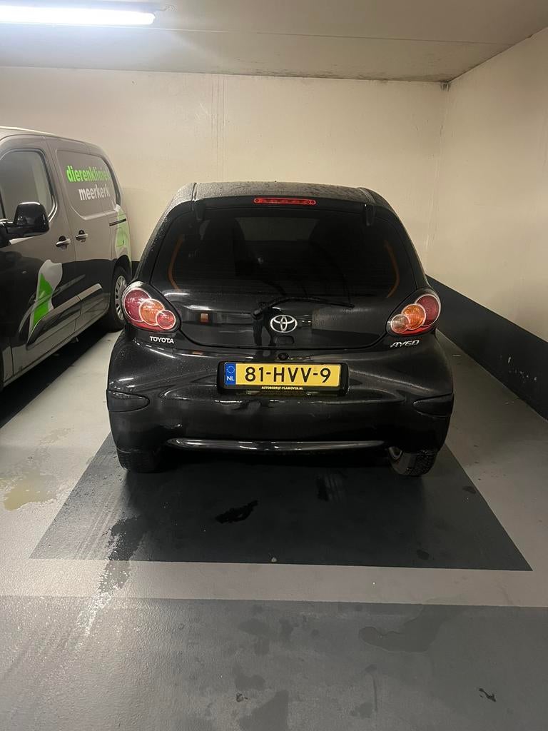 Toyota Aygo 1.0 12V Vvt-i 5DRS 2009 Zwart, Auto's, Voorwielaandrijving, 4 stoelen, Origineel Nederlands, Bedrijf