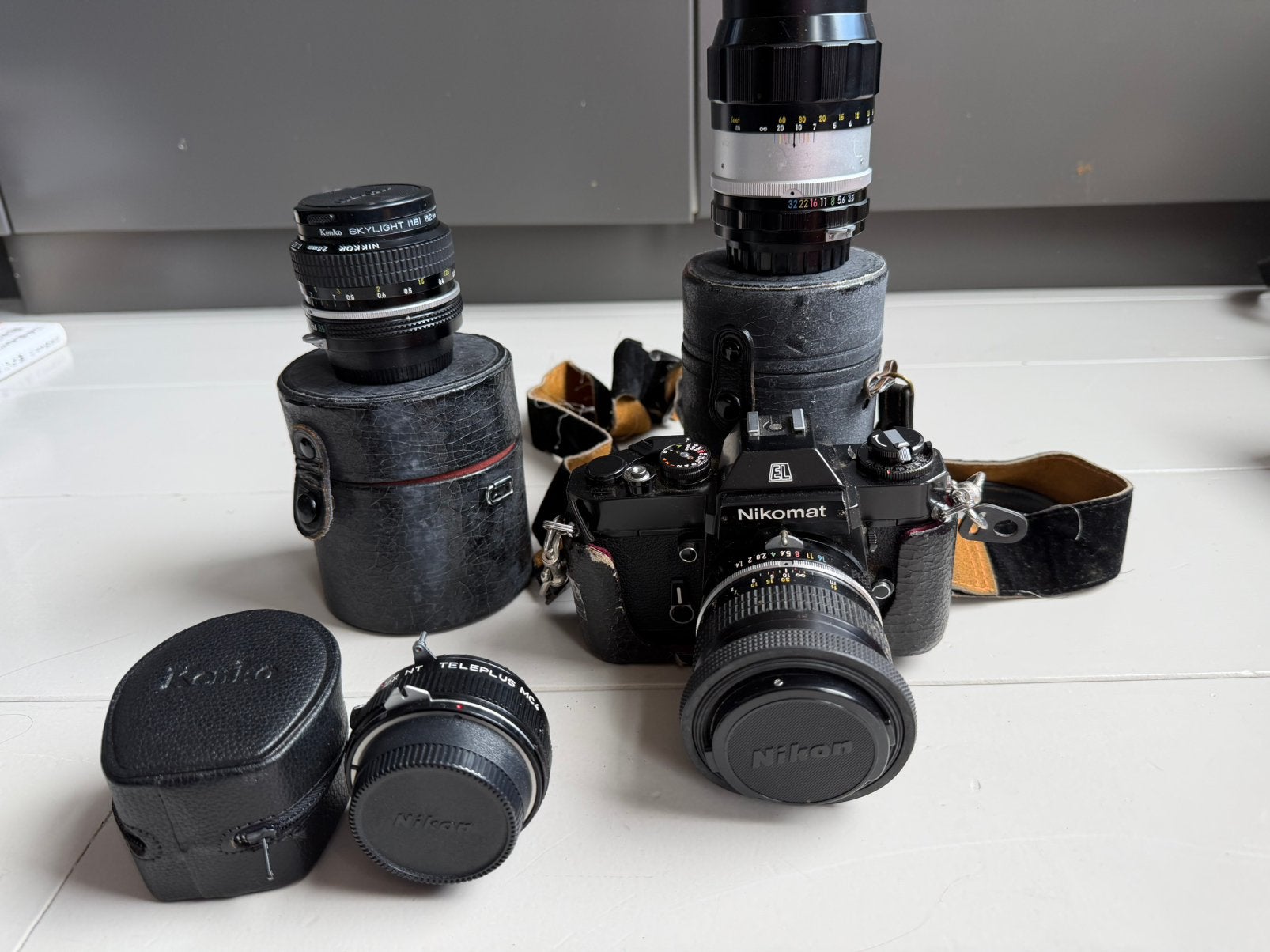 Nikon Nikomat EL analoge camera +3 lenzen, teleconverter&kof, Ophalen of Verzenden, Gebruikt