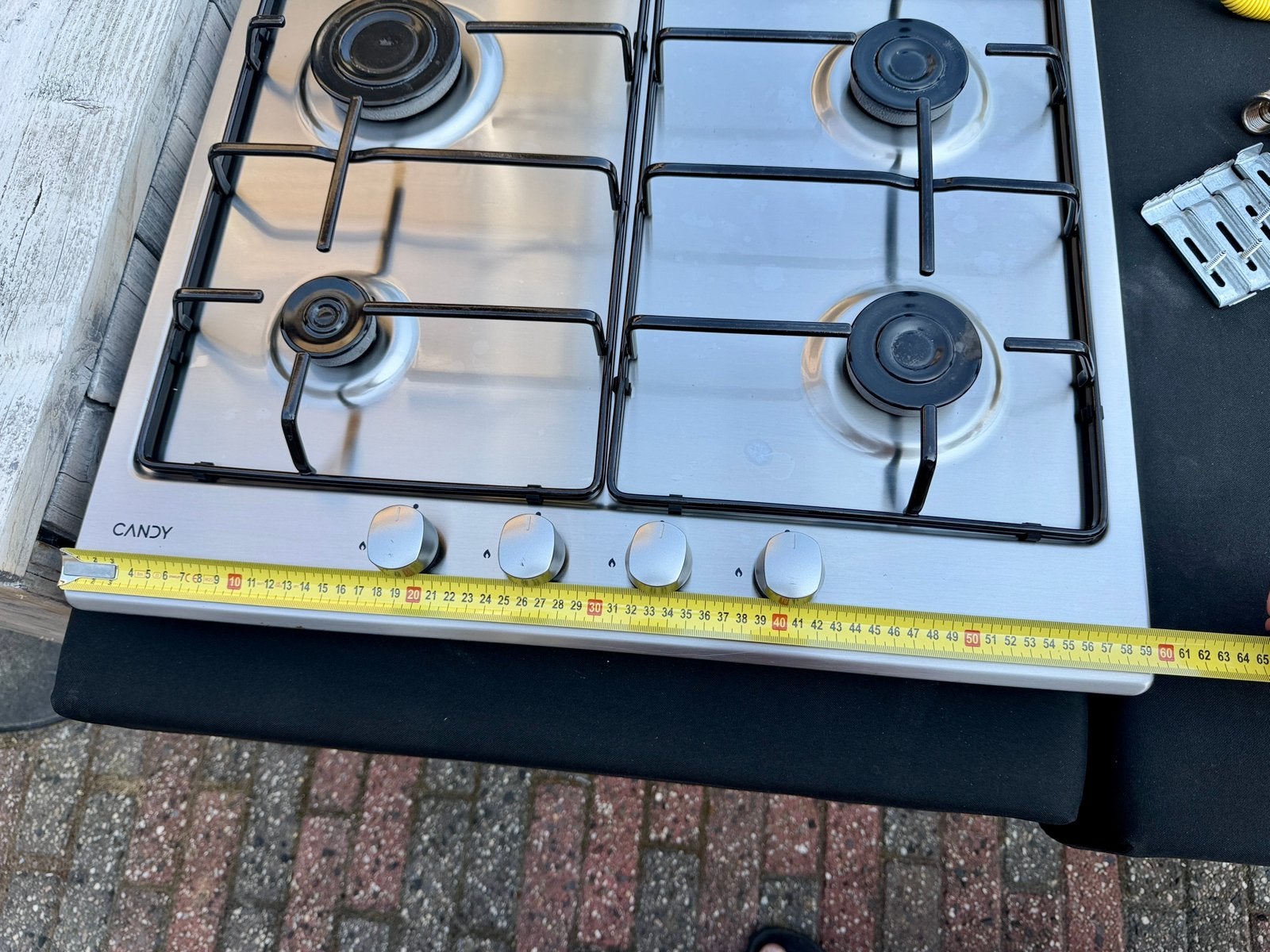 Candy rvs kookplaat met elektrische ontsteking, Witgoed en Apparatuur, Ophalen, Gebruikt, 4 kookzones, Energieklasse A of zuiniger