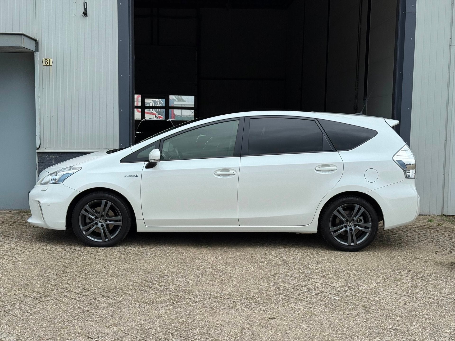 Toyota Prius Wagon 1.8 Dynamic Full Hybrid 7P Pano|NAP|Camer, Auto's, Gebruikt, Zwart, 4 cilinders, 7 stoelen