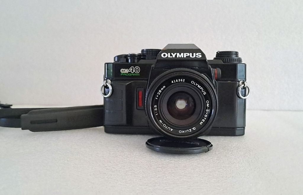 Olympus OM 40 Program + OM G. Zuiko Auto-W 1:3.5 28mm, Ophalen of Verzenden, Gebruikt, Spiegelreflex, Olympus