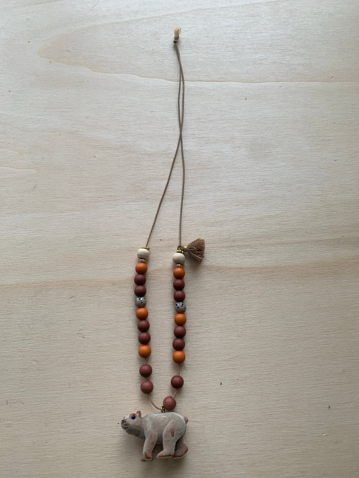Houten kralen ketting met beer hanger, Gebruikt, Bruin, Ophalen of Verzenden, Overige materialen