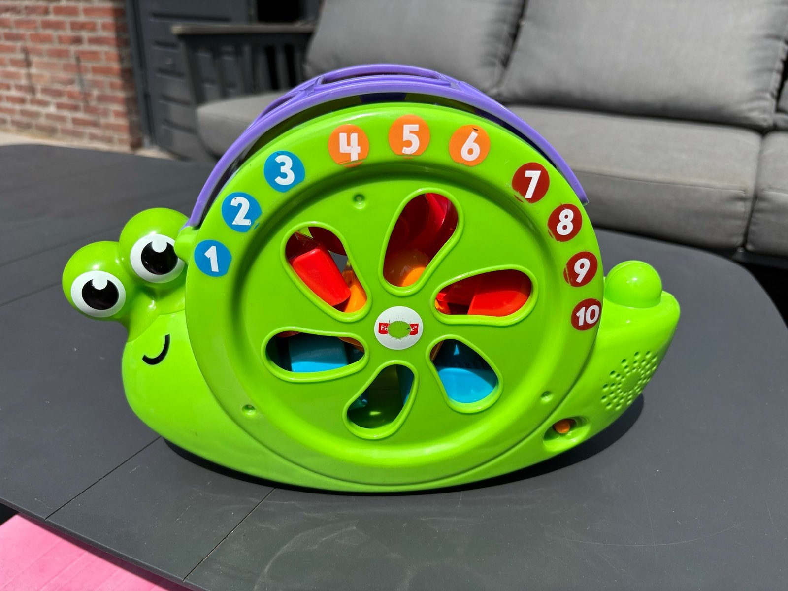 Fisher Price Muzikale Slak met 10 Blokjes, Ophalen of Verzenden, Gebruikt, Overige typen, Met geluid