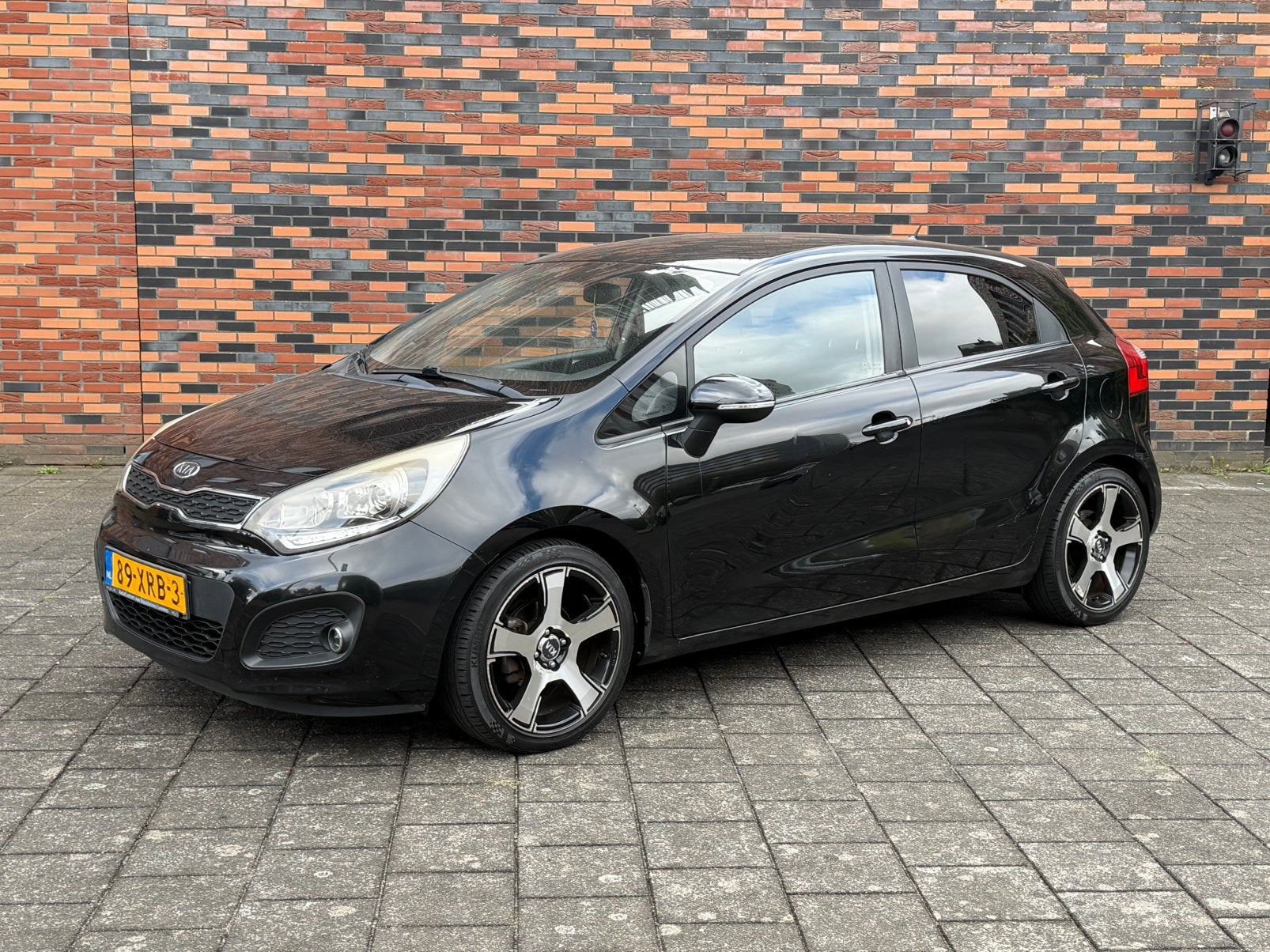 Kia Rio 1.2 CVVT Super Pack /Airco/Cruise control, Auto's, Kia, Euro 5, Zwart, 4 cilinders, Zwart
