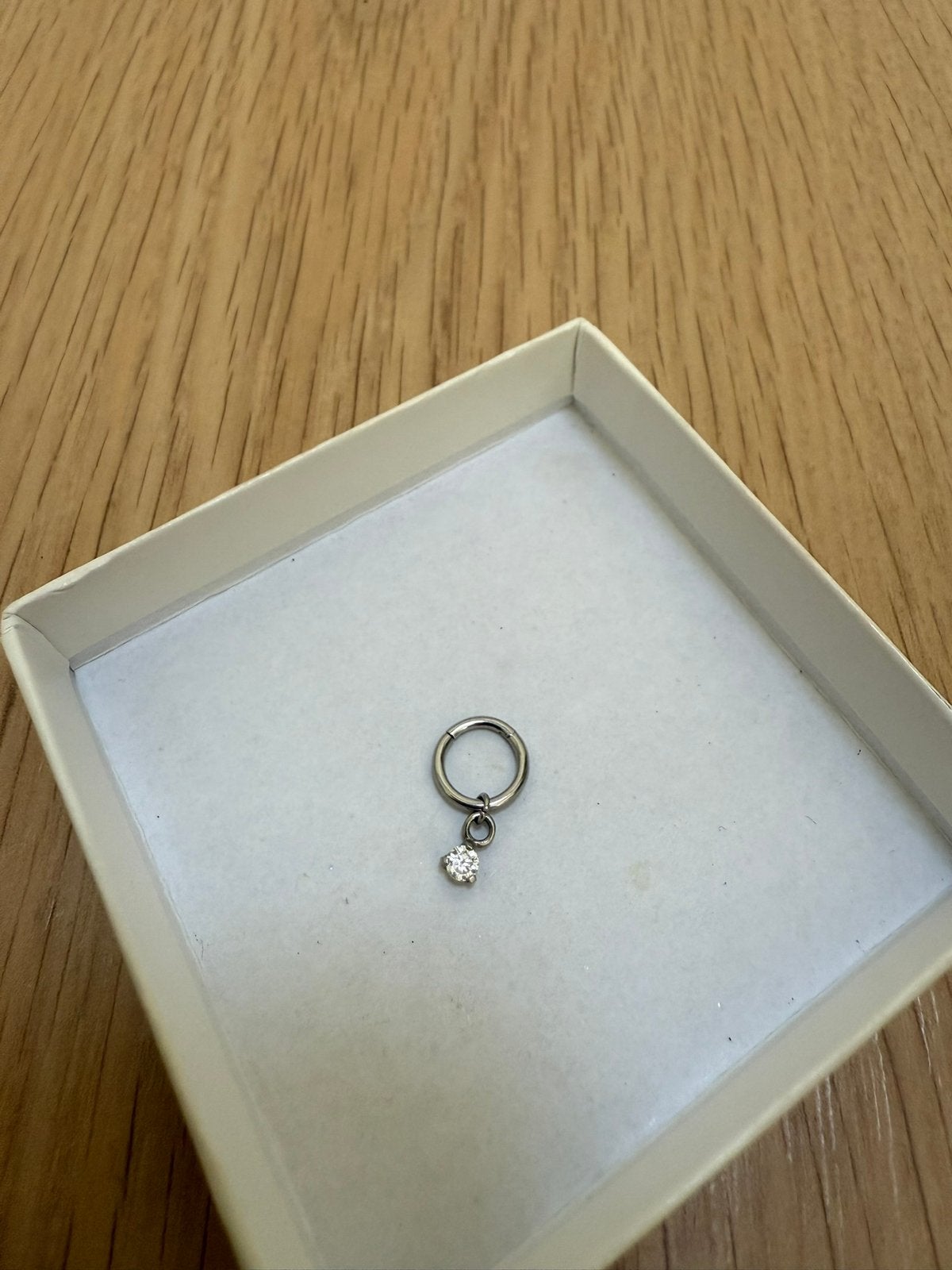 Septum clicker met hangertje, Ophalen of Verzenden, Zo goed als nieuw, Staal