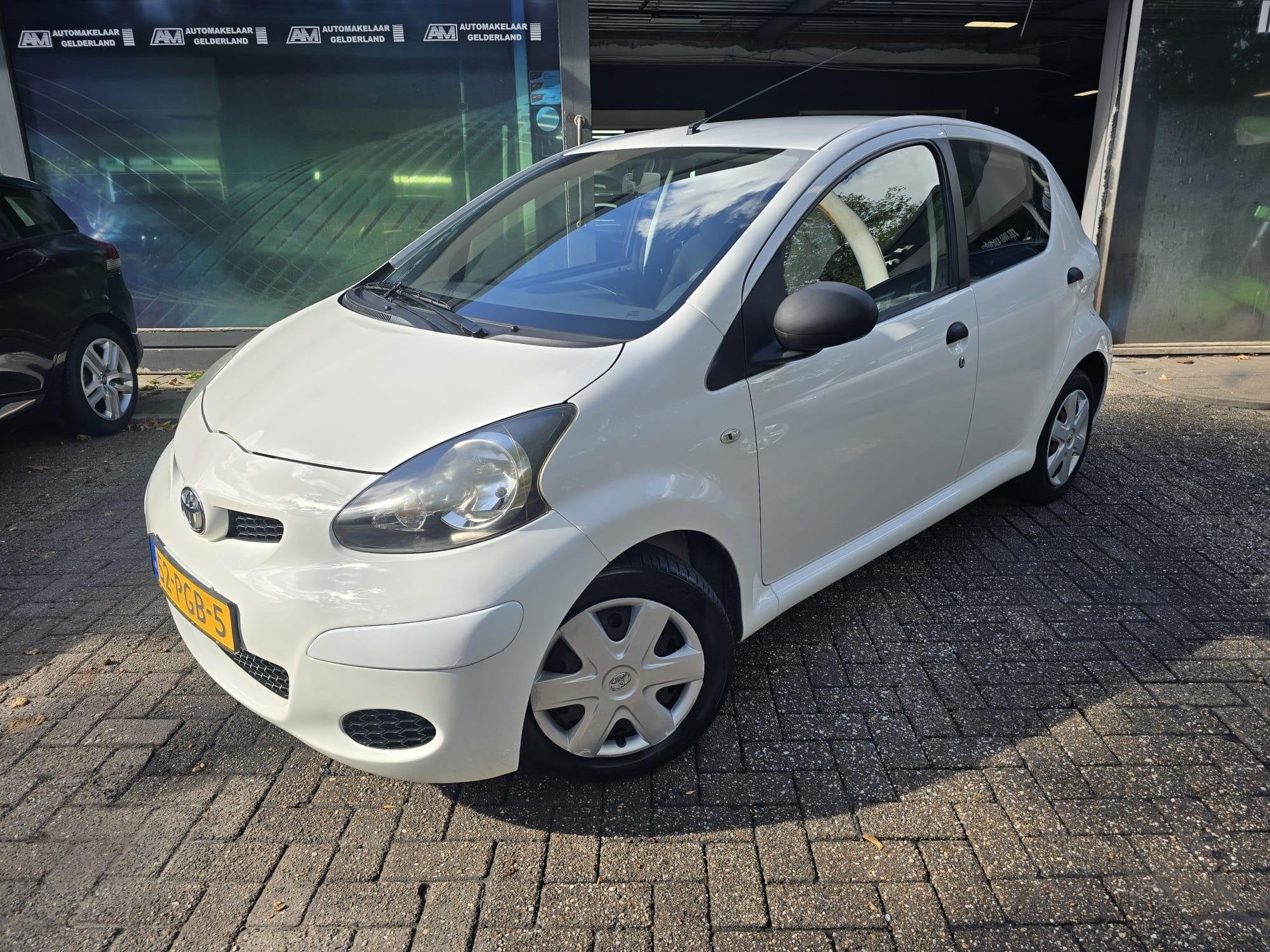 Toyota Aygo 1.0-12V Access | 1E EIGENAAR | 3/6 OF 12MND GARA, Voorwielaandrijving, Stof, Gebruikt, Origineel Nederlands