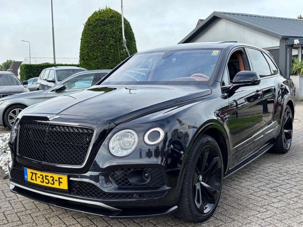 Bentley Bentayga 6.0 W12 Mulliner 2018 Zwart Carbon Akraprov, Auto's, Automaat, Bentayga, Gebruikt, Euro 6