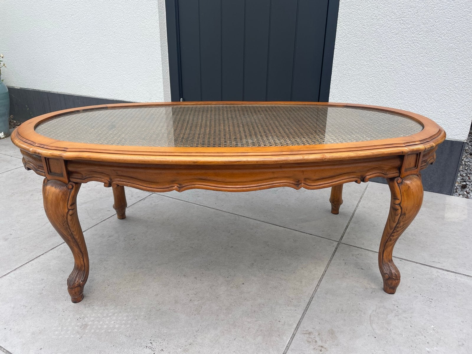 Ovale salontafel met glasplaat en rotan, Ophalen