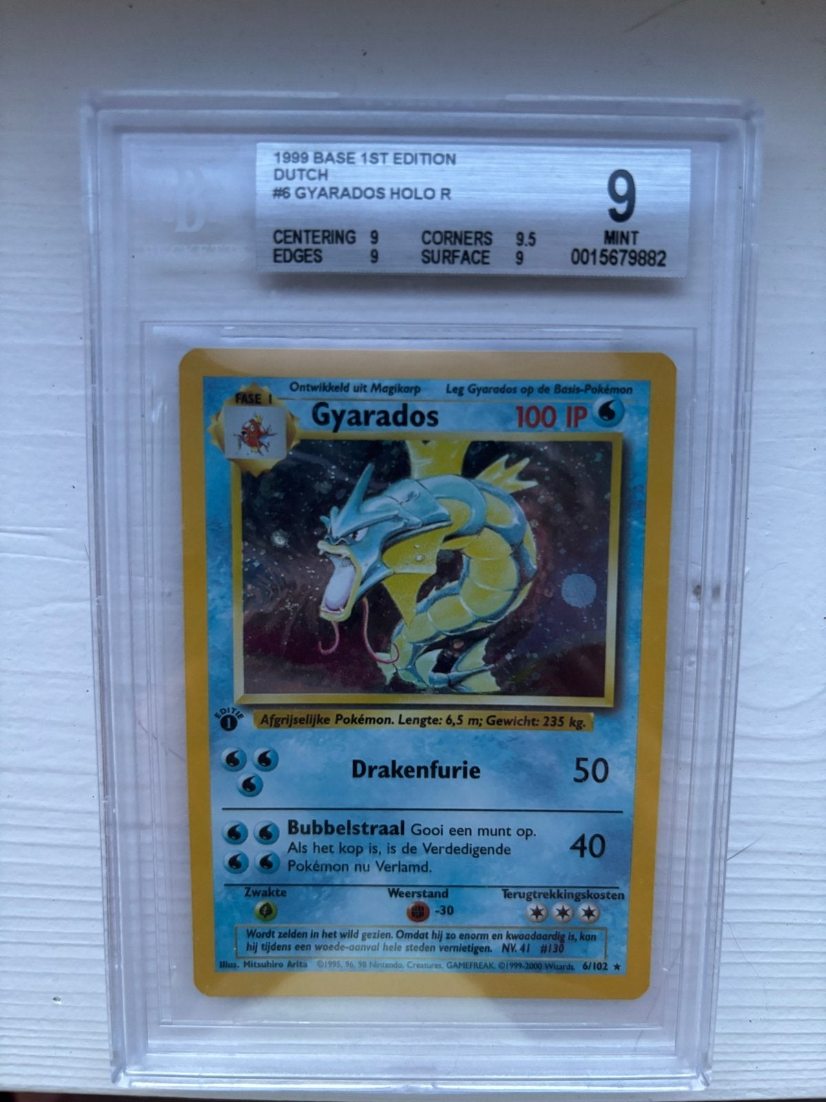 Gyarados Holo 1st Edition Dutch 1999 Base Set bgs 9, Ophalen of Verzenden, Zo goed als nieuw, Losse kaart, Foil