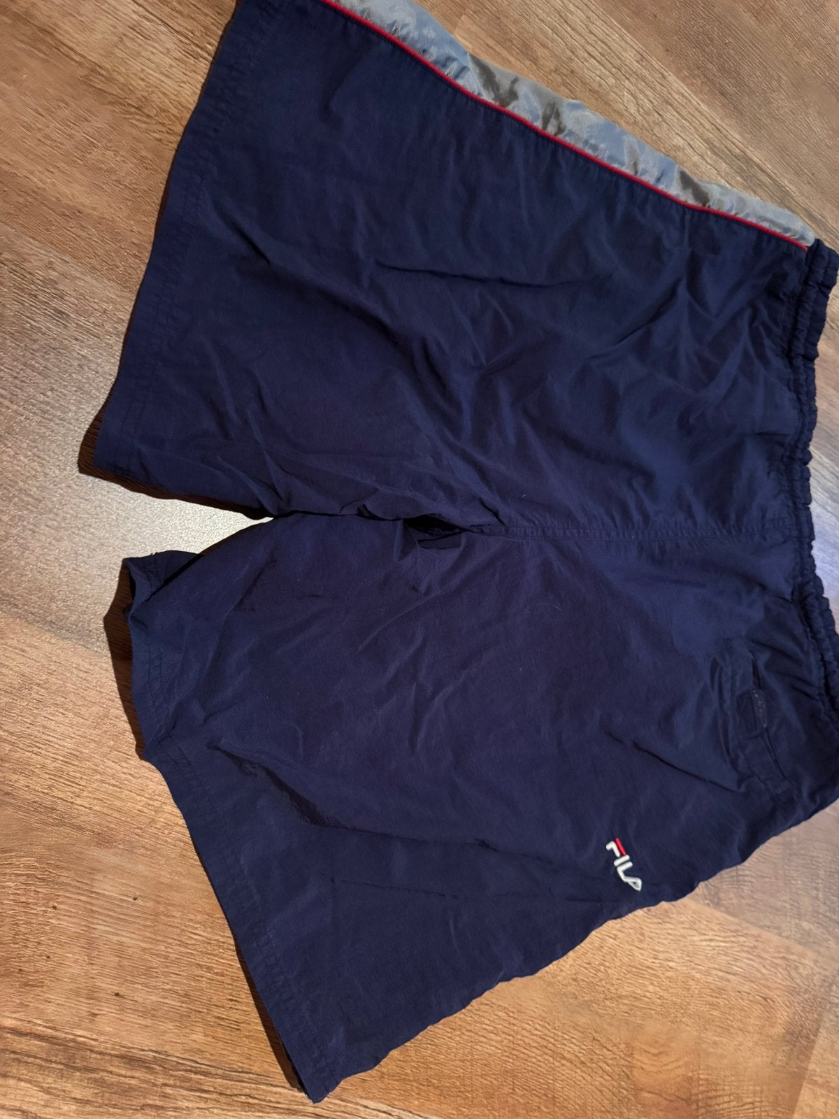 2 korte broeken van Nke en Fila, Ophalen of Verzenden, Blauw