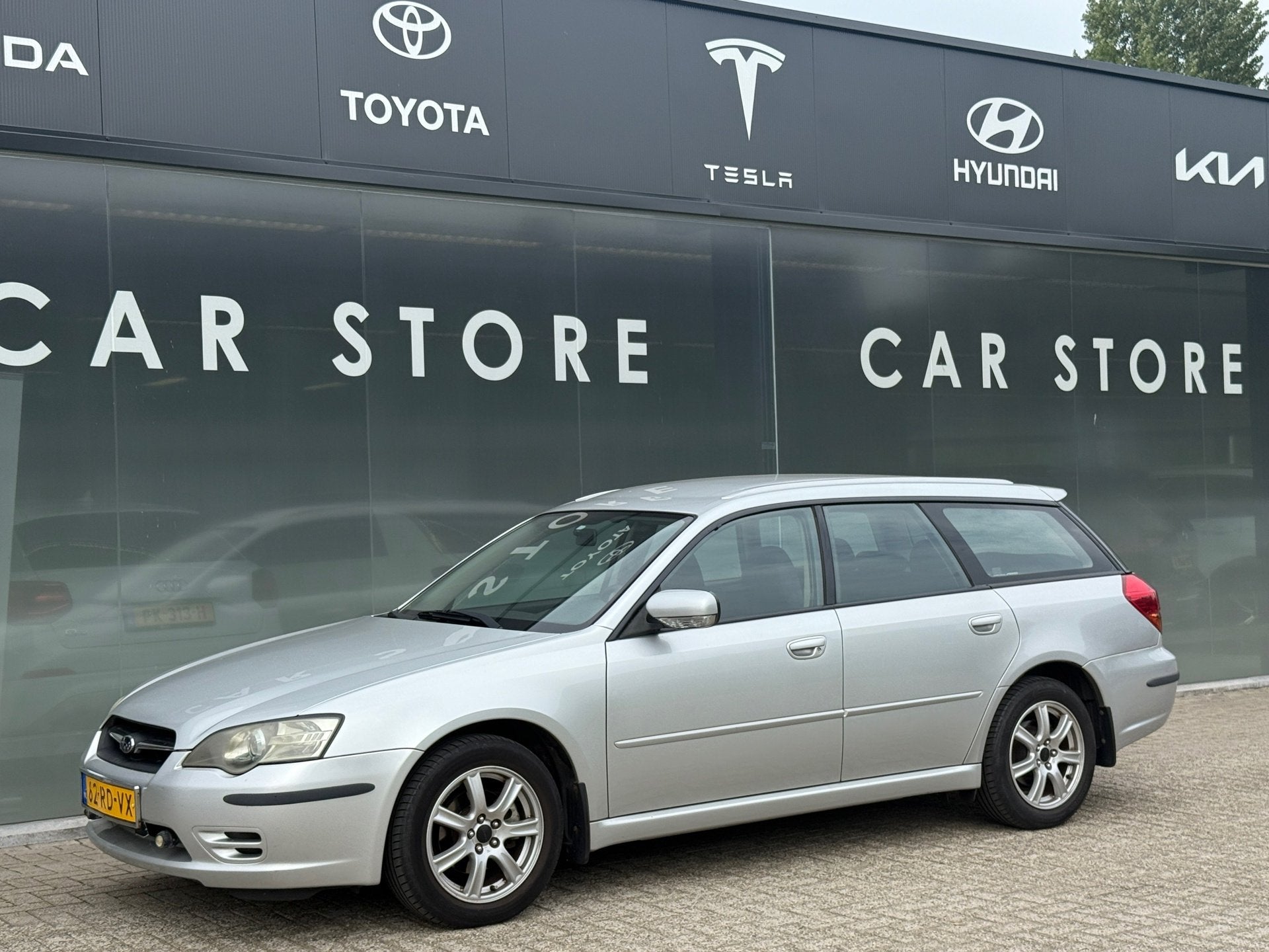 Subaru Legacy Touring Wagon 2.0i Dealer Onderhouden TOP STAA, Auto's, Dealer onderhouden, Gebruikt, Zwart, 4 cilinders