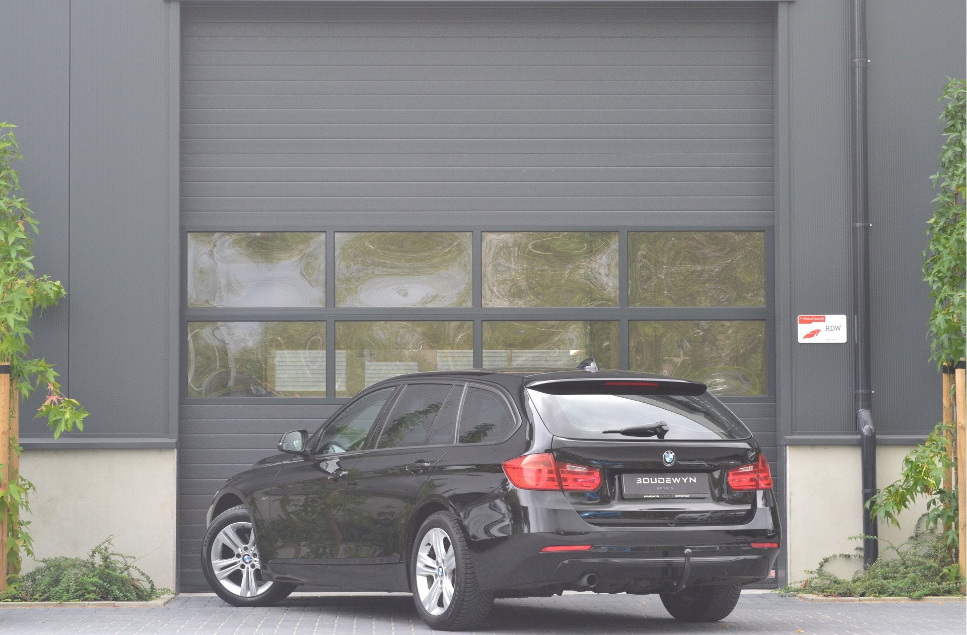 BMW 3 Serie Touring 316i Sportline Cruise Control | Stoelver, Auto's, Euro 6, 4 cilinders, Zwart, Handgeschakeld