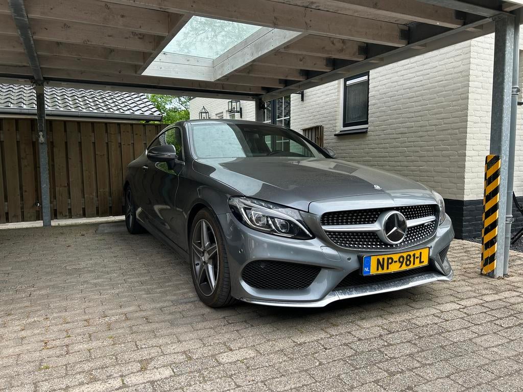 Mercedes C-Klasse 2.0 C200 Coupe Distronic Plus AMG line, Auto's, Mercedes-Benz, Achterwielaandrijving, 1800 kg, Zwart, 4 cilinders