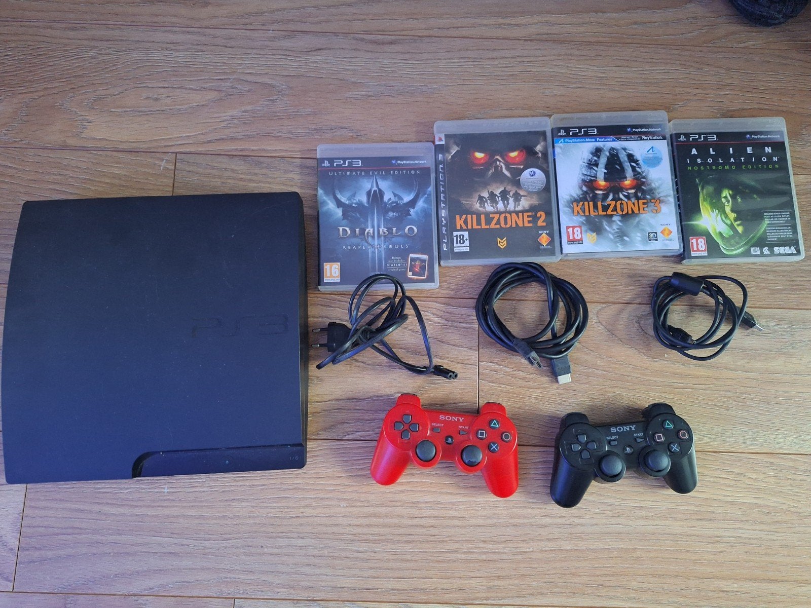 PlayStation 3 Slim 160GB met 2 controllers en 4 games, Met 2 controllers, Ophalen of Verzenden, Zo goed als nieuw, S