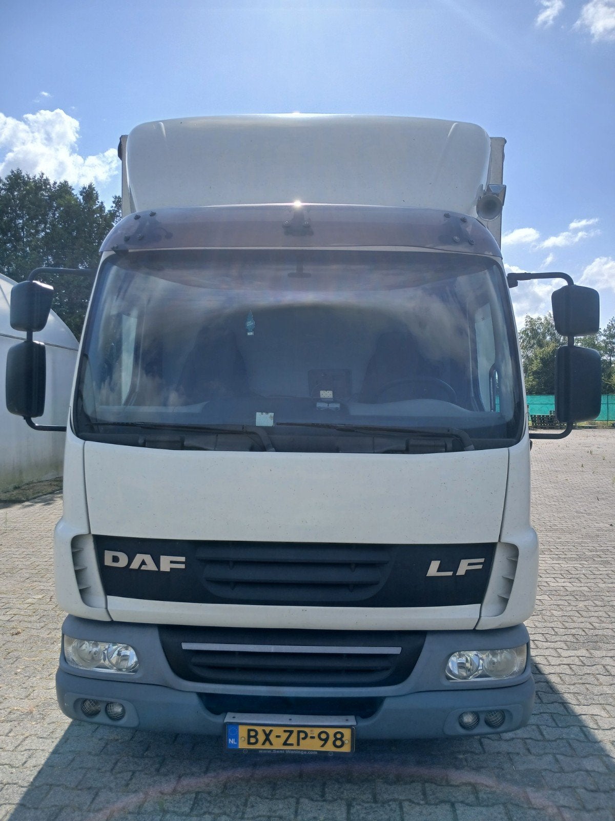 Daf LF 45. 250 6 cyl met aanhanger, Auto's, Euro 5, Zwart, Wit, Particulier