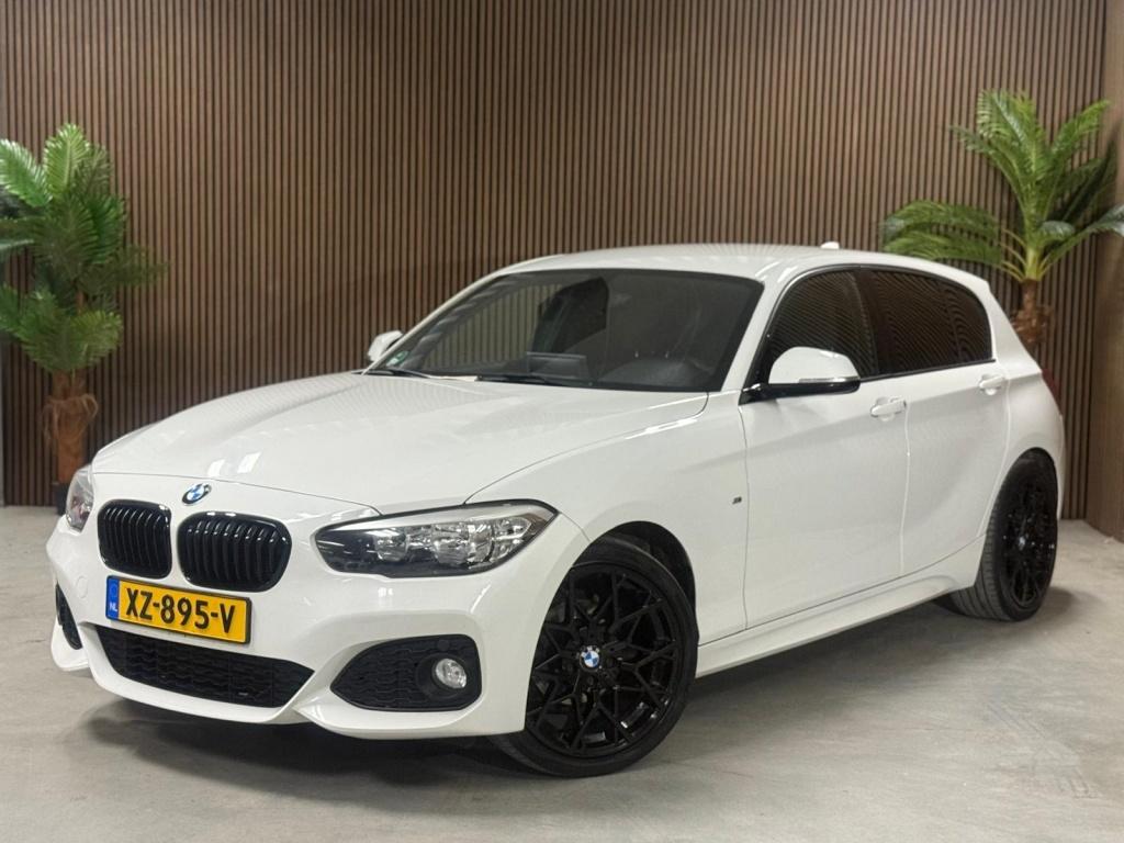 BMW 1-serie 116i M Sport Edition sport uitlaatsysteem, Auto's, BMW, 1-Serie, Achterwielaandrijving, Euro 6, Wit