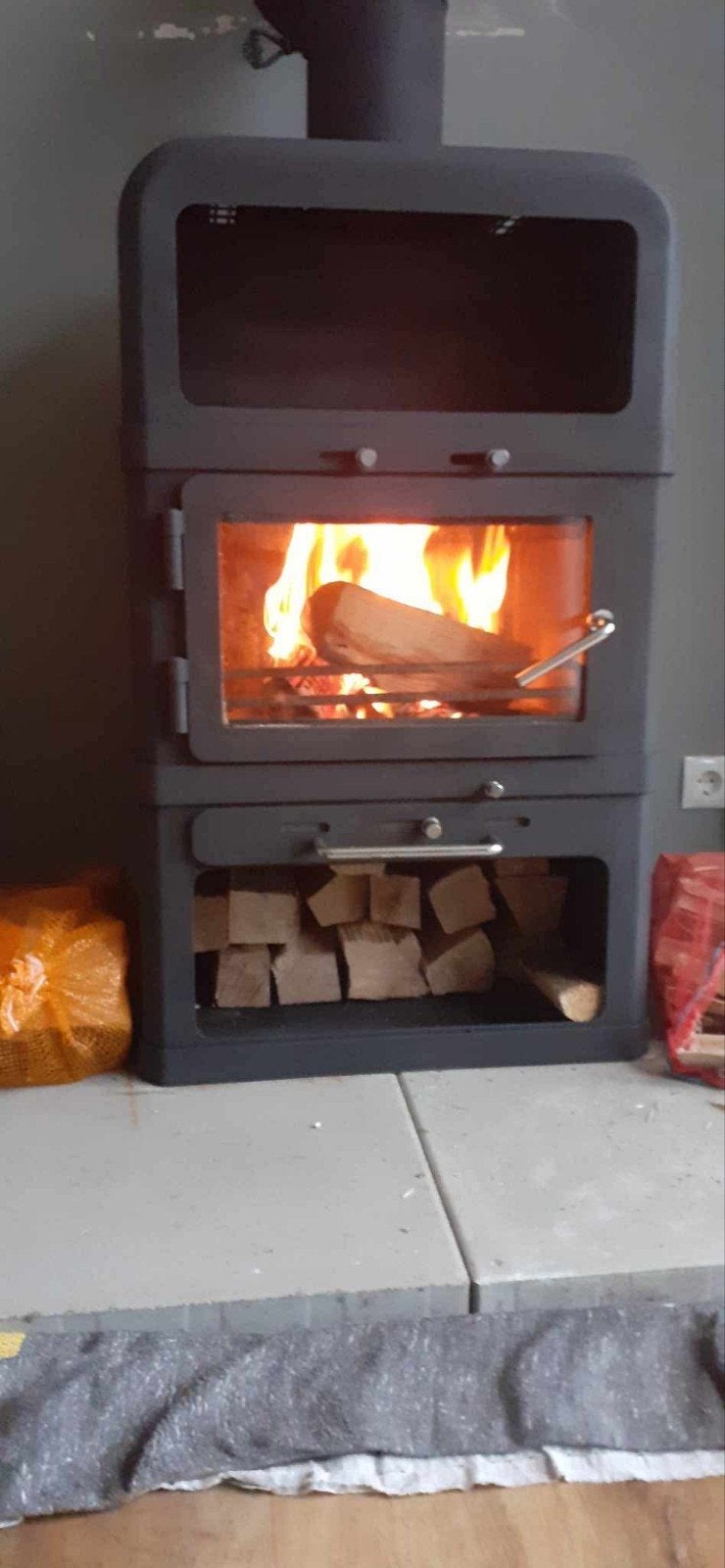 Speksteen houtkachel met Opslagruimte, Ophalen