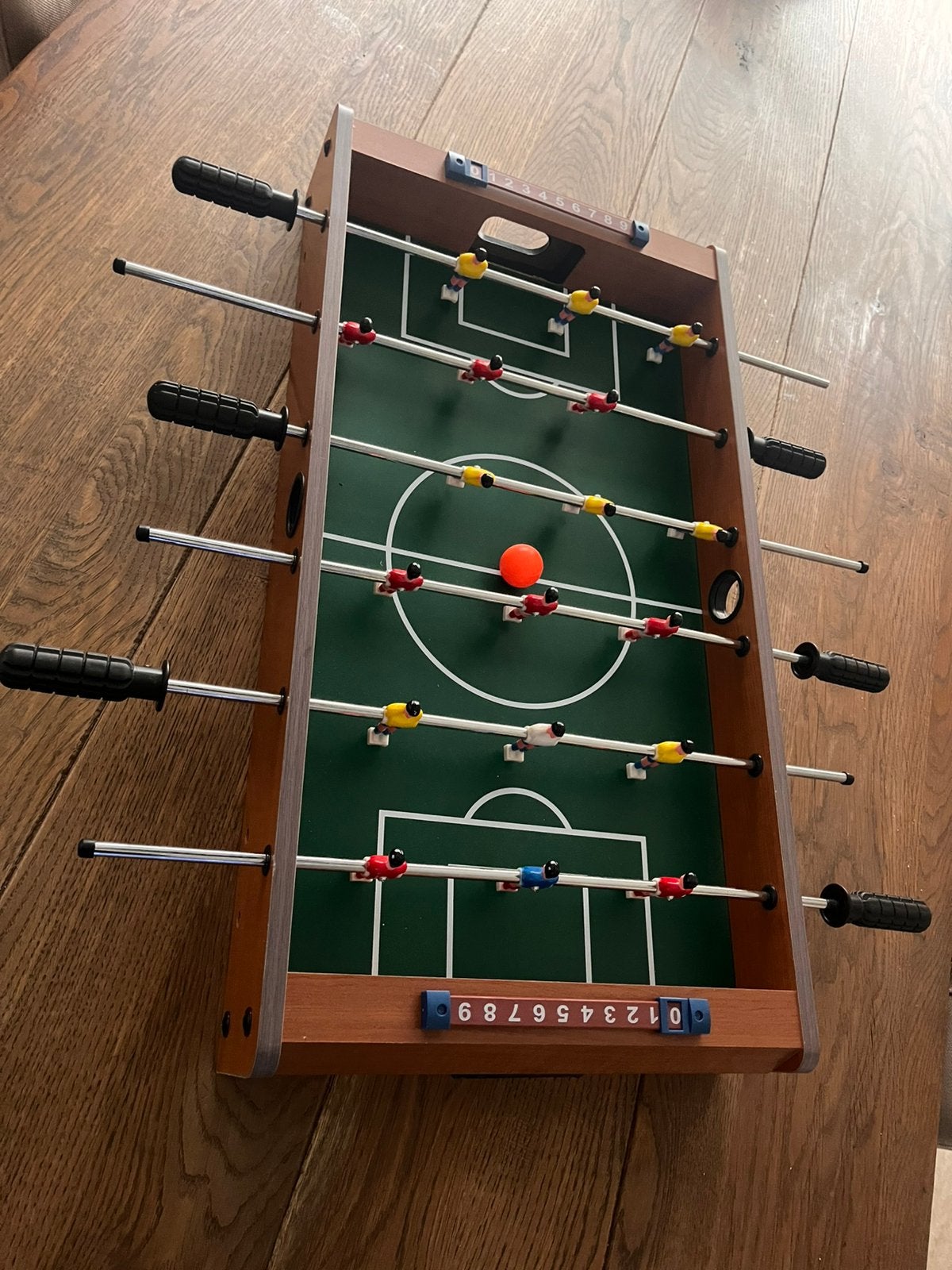 Voetbal tafel, Ophalen