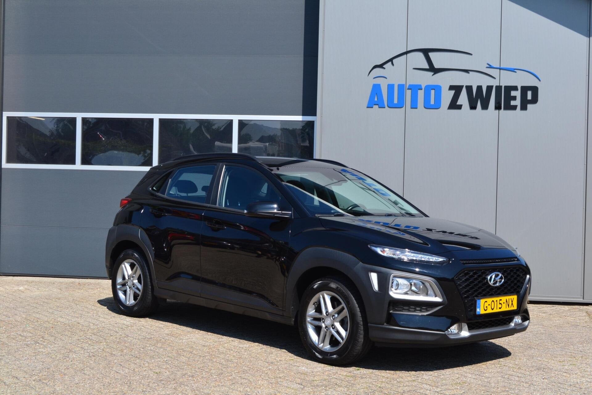 Hyundai Kona 1.0 T-GDI Premium Camera/airco/navi/carplay, Auto's, Voorwielaandrijving, Euro 6, Zwart, Handgeschakeld