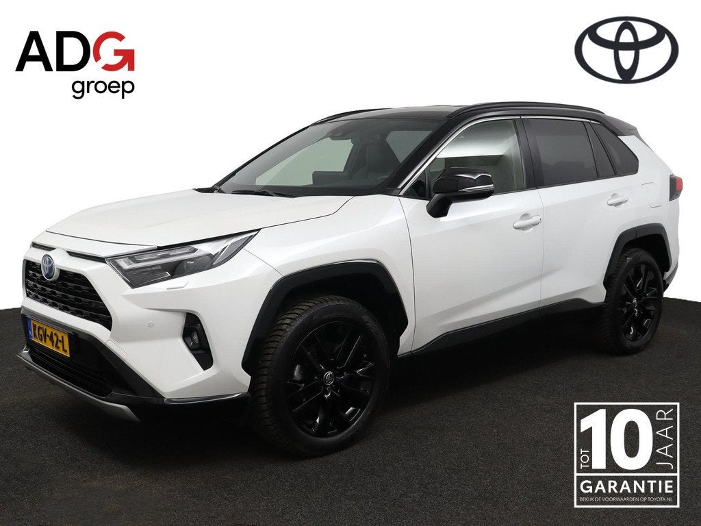 Toyota RAV4 2.5 Hybrid AWD Bi-Tone | Stoel- en Stuurwielverw, Auto's, Toyota, Automaat, 12 maanden, Gebruikt, 4 cilinders