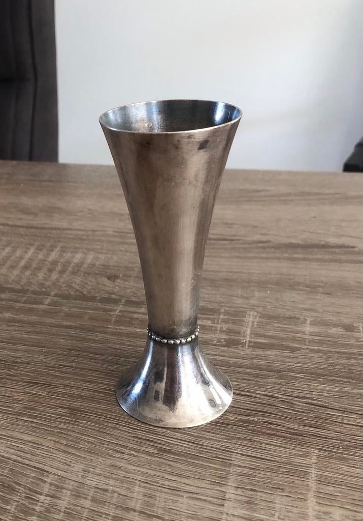 Verzilverd Vaasje, Ophalen