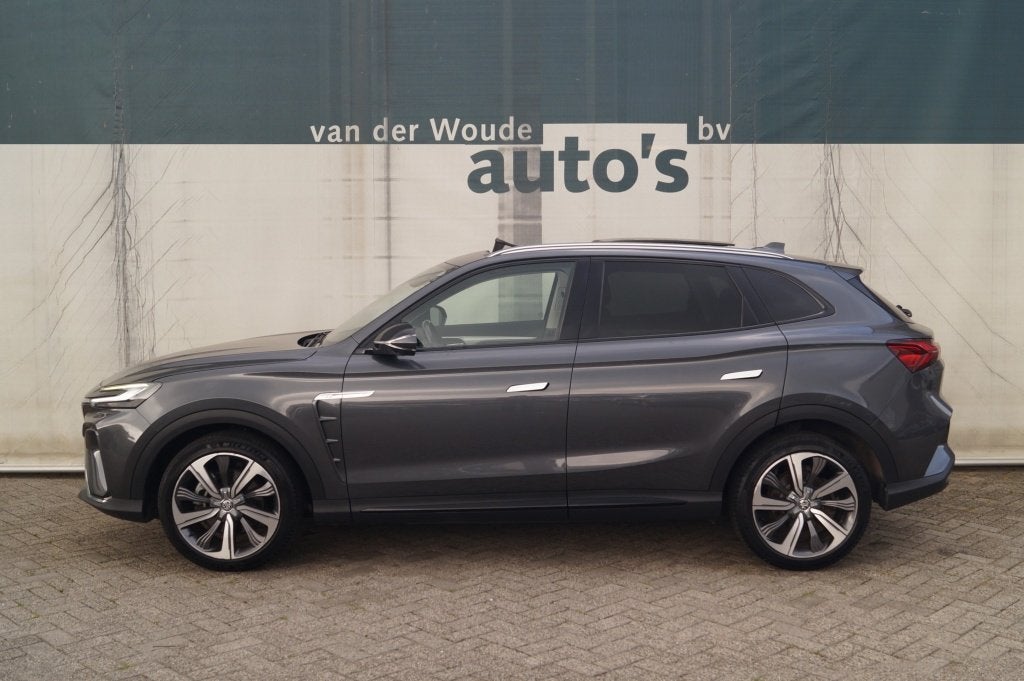 MG Marvel R Luxury 70 kWh -SOH92%-PANO-LEER-TREKHAAK-, Auto's, Automaat, Dealer onderhouden, Gebruikt, 750 kg