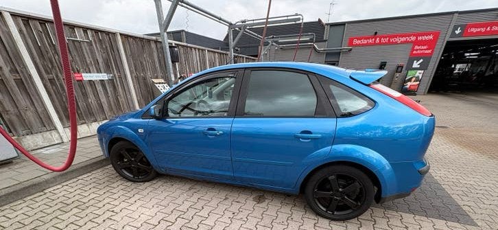 Ford Focus 1.6 85KW 5D 2006 Blauw, Auto's, 625 kg, 4 cilinders, Blauw, Leder en Stof