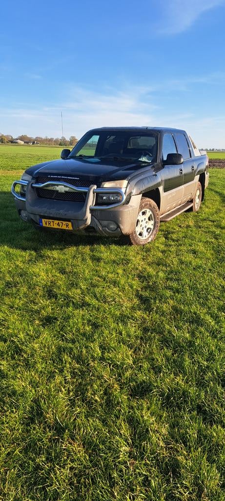 Chevrolet avalanche 2001 4x4 grijs kenteken lage km stand, Auto's, Chevrolet, 288 pk, Overige carrosserieën, Zwart, Bedrijf