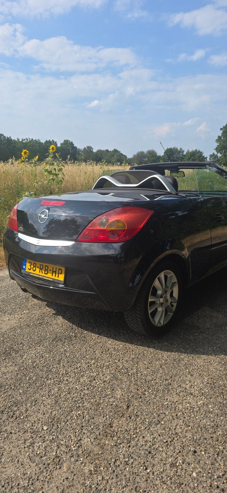 Opel Tigra 1.4 16V Twintop  2005 Zwart APK  20-01-2027, Auto's, Voorwielaandrijving, 4 cilinders, Cabriolet, Origineel Nederlands