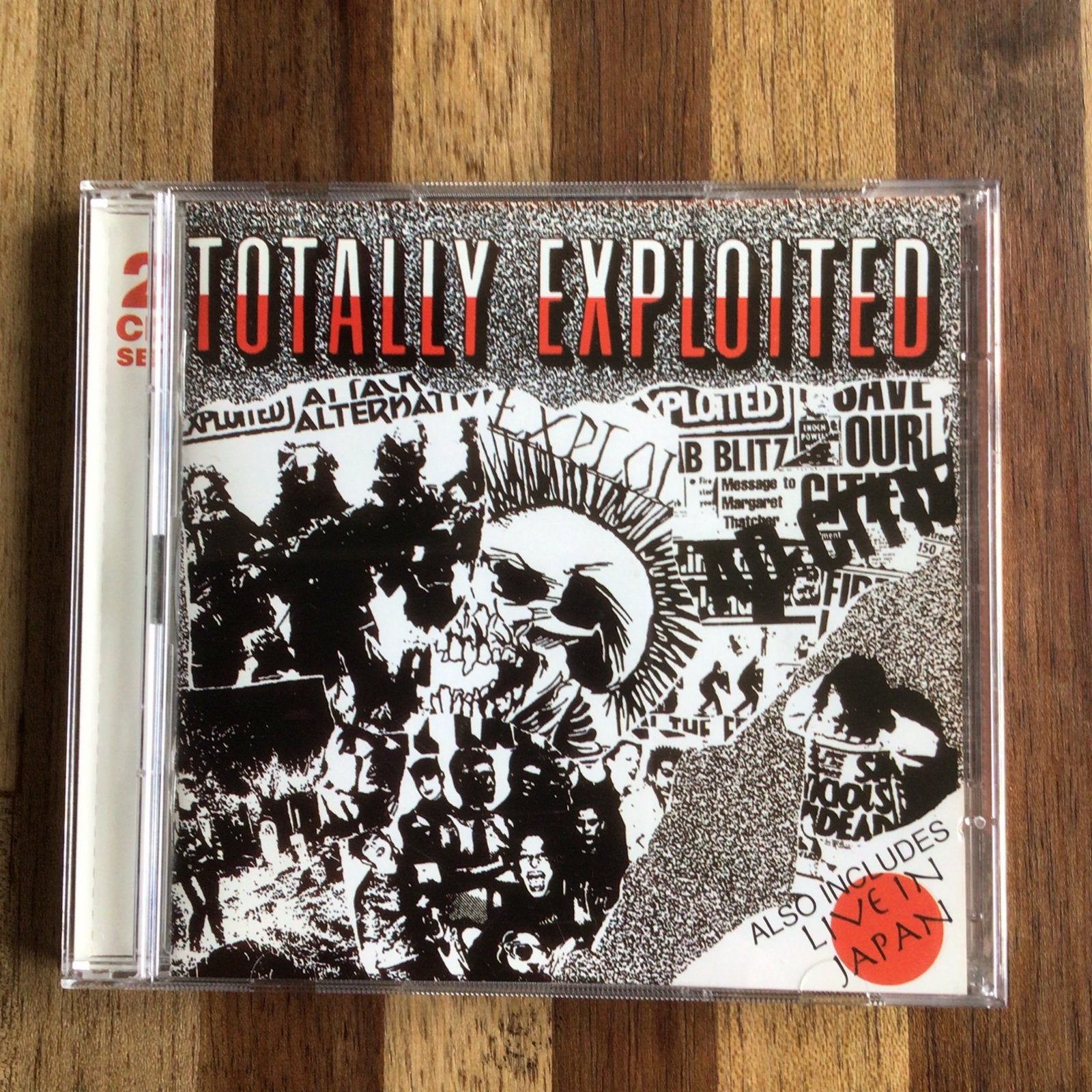 Exploited - 2-cd - Totally Exploited + Live in Japan, Ophalen of Verzenden, Zo goed als nieuw, Poprock