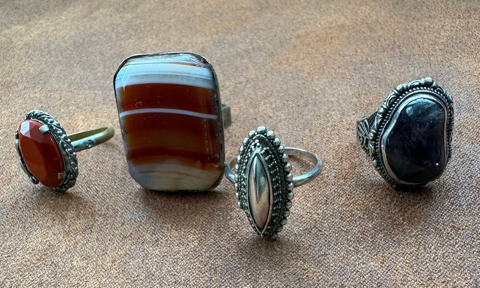 4 zilverkleurige ringen, Gebruikt, IJzer of Staal, Oranje, Ophalen of Verzenden