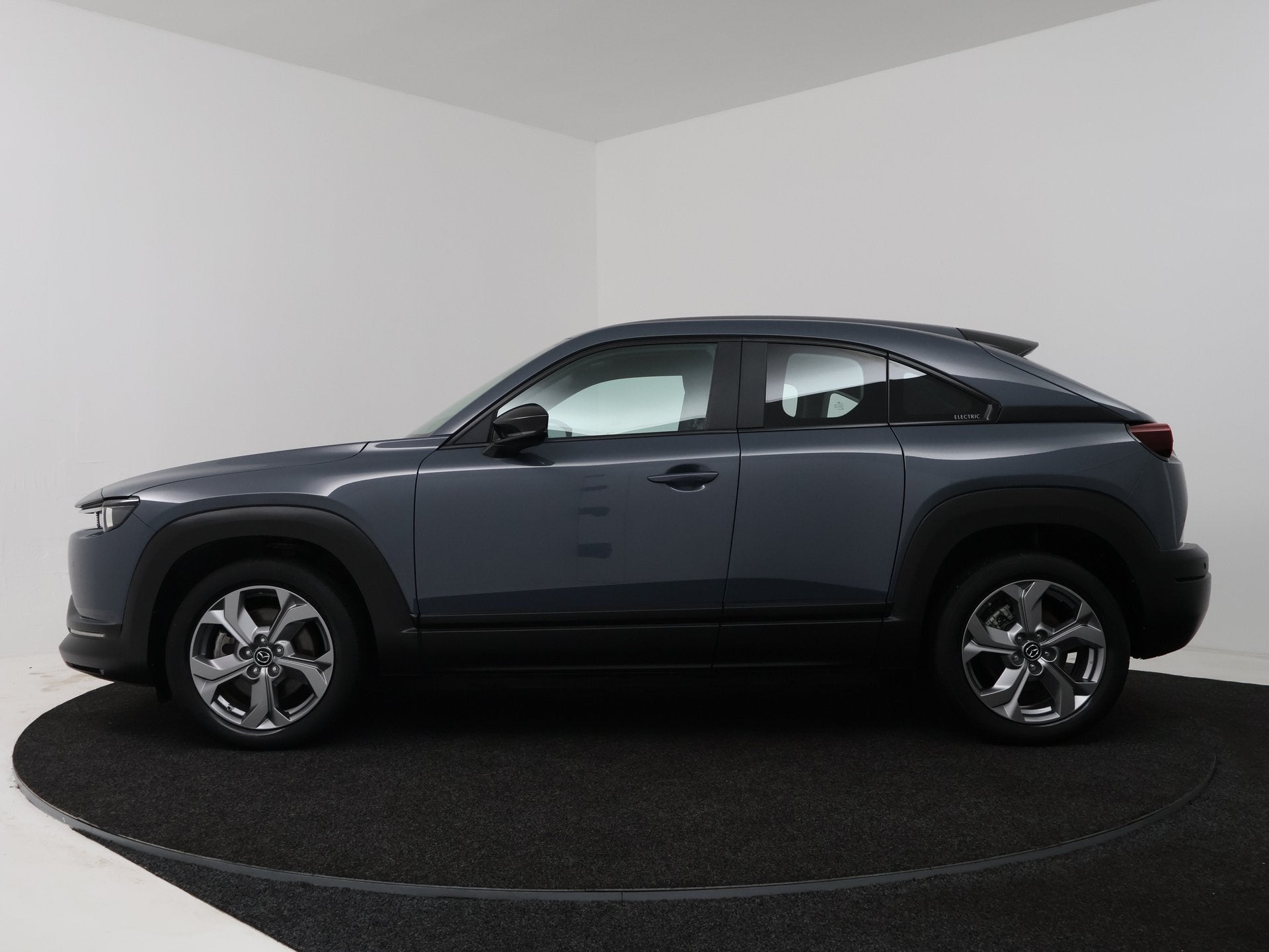 Mazda MX-30 e-SkyActiv 145 Comfort 36 kWh (bj 2021), Auto's, Mazda, Stof, Gebruikt, 35 kWh, Origineel Nederlands