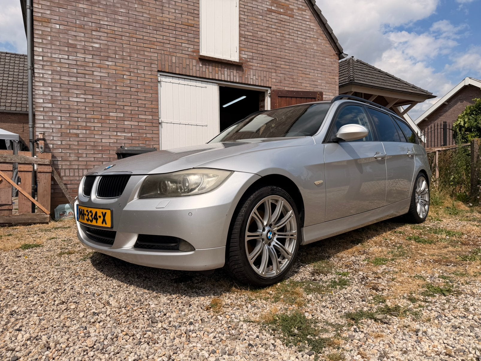 BMW 3-Serie 2.0 I 320 Touring 2006 Grijs E91, 13 km/l, Achterwielaandrijving, 1995 cc, Zwart